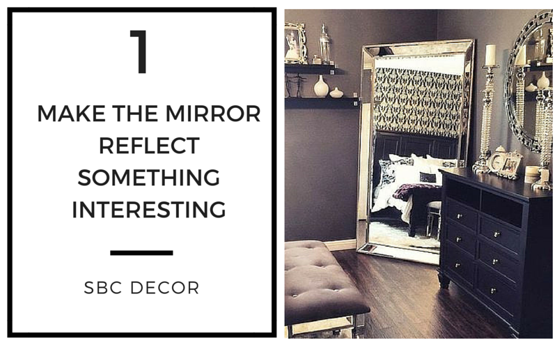 mirror reflecting bedroom